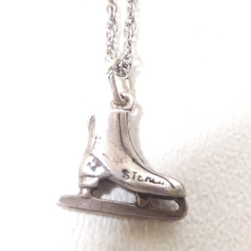 Vintage Sterling Silver Ice Skate charm.